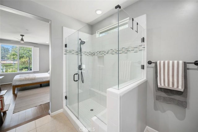 1012 Maggie Ln, Nipomo, CA 93444 - ensuite bathroom featuring healthy amount of natural light, a ceiling fan, a shower stall, and tile patterned flooring