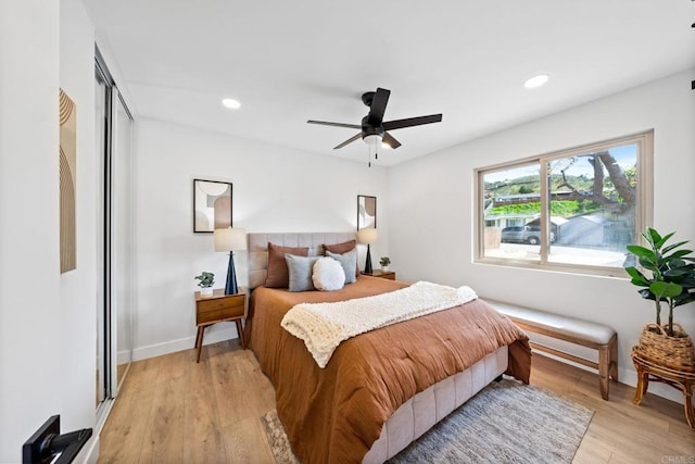 9121 Heatherdale St, Santee, CA 92071 - bedroom with light wood finished floors, recessed lighting, and ceiling fan
