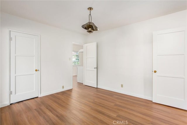722 E 19th St, San Bernardino, CA 92404 - unfurnished room with light wood-style flooring