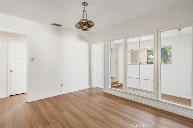 722 E 19th St, San Bernardino, CA 92404 - unfurnished room featuring light wood finished floors and baseboards