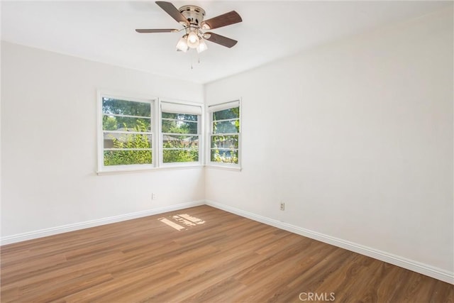 722 E 19th St, San Bernardino, CA 92404 - spare room featuring light wood-style flooring and ceiling fan