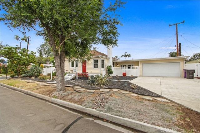 4841 E Los Coyotes Diagonal, Long Beach, CA 90815 - view of front facade with a garage and driveway