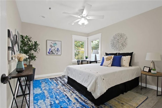 4841 E Los Coyotes Diagonal, Long Beach, CA 90815 - bedroom featuring wood finished floors and a ceiling fan