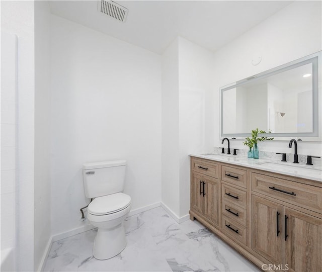 13801 Shirley St Unit 14, Garden Grove, CA 92843 - full bathroom with double vanity and marble look tile flooring