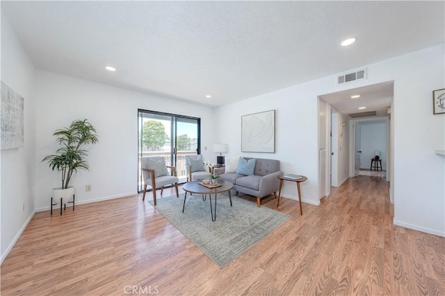 13801 Shirley St Unit 14, Garden Grove, CA 92843 - living room with light wood-style flooring and recessed lighting