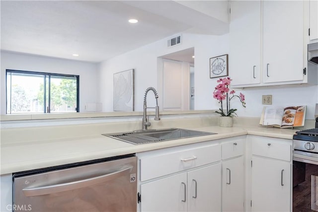 13801 Shirley St Unit 14, Garden Grove, CA 92843 - kitchen featuring stainless steel appliances, light countertops, white cabinetry, and recessed lighting