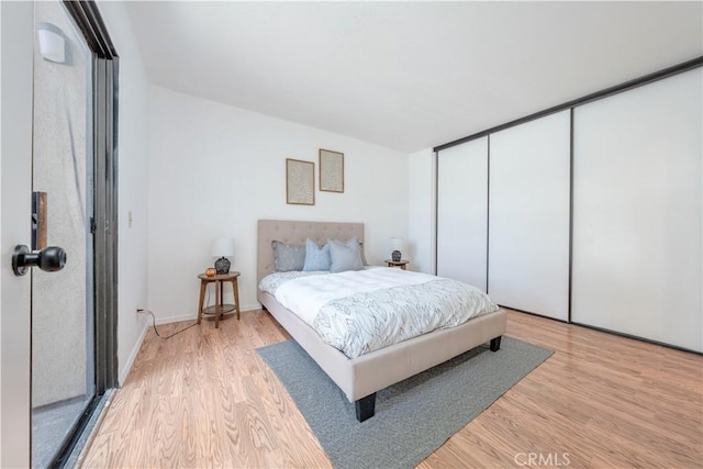 13801 Shirley St Unit 14, Garden Grove, CA 92843 - bedroom with light wood-style flooring and a closet