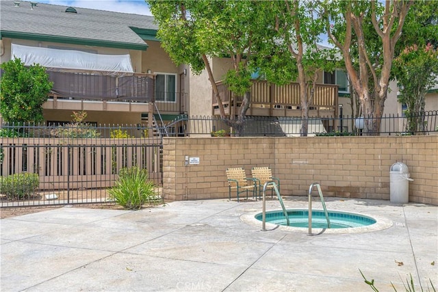 13801 Shirley St Unit 14, Garden Grove, CA 92843 - view of swimming pool featuring a community hot tub