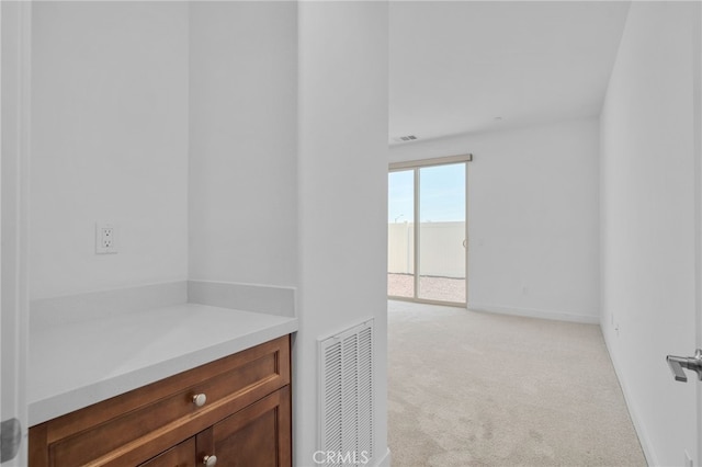 1649 Spring Run Ln, Beaumont, CA 92223 - hall featuring light colored carpet and baseboards