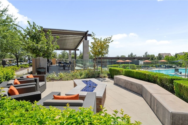 1649 Spring Run Ln, Beaumont, CA 92223 - view of community featuring a patio, a swimming pool, and an outdoor living space with a fire pit