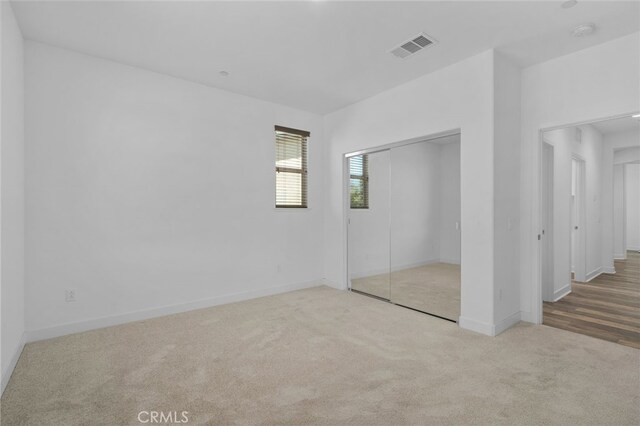 1649 Spring Run Ln, Beaumont, CA 92223 - unfurnished bedroom with carpet flooring and a closet