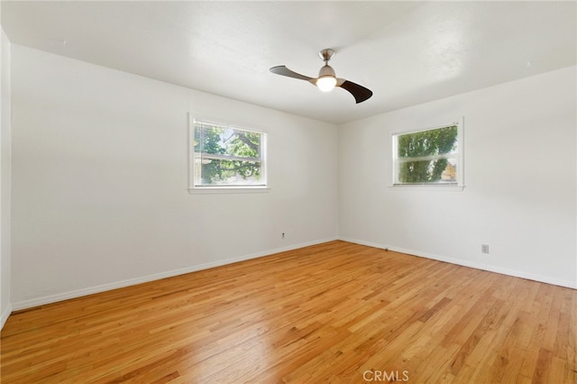 2723 57th St, Sacramento, CA 95817 - unfurnished room featuring plenty of natural light, light wood-type flooring, and ceiling fan