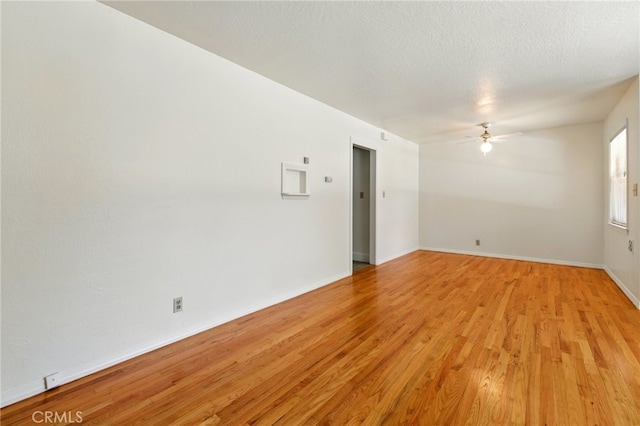 2723 57th St, Sacramento, CA 95817 - empty room with light wood-type flooring and ceiling fan