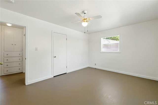 2723 57th St, Sacramento, CA 95817 - unfurnished bedroom featuring finished concrete flooring and a ceiling fan