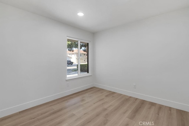 13020 Beach St, Cerritos, CA 90703 - empty room featuring light wood-type flooring and recessed lighting