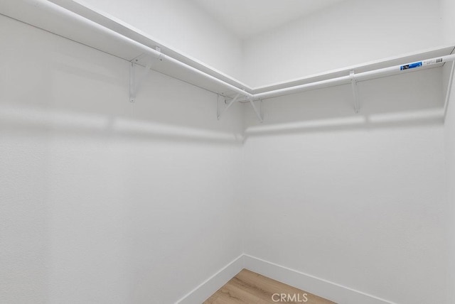 13020 Beach St, Cerritos, CA 90703 - walk in closet featuring light wood-style flooring