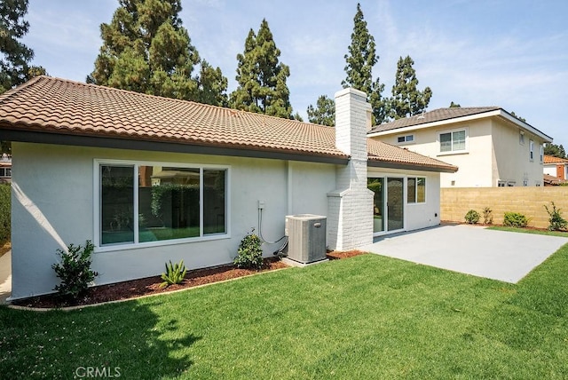 13020 Beach St, Cerritos, CA 90703 - back of house featuring a patio area, a tiled roof, and stucco siding