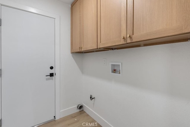 13020 Beach St, Cerritos, CA 90703 - laundry room with cabinet space, light wood-type flooring, and washer hookup