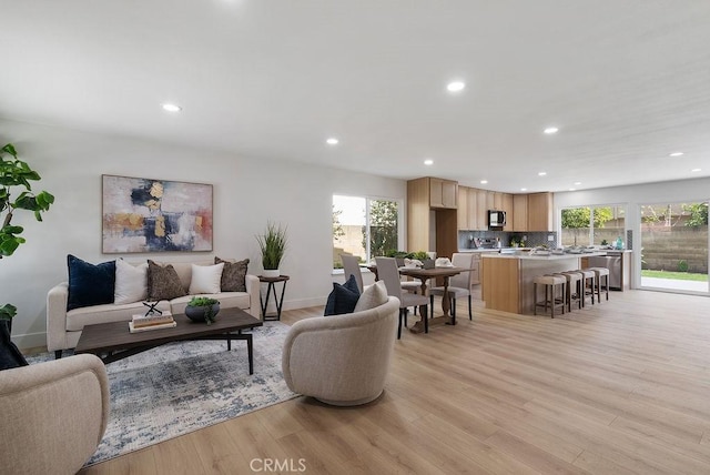13020 Beach St, Cerritos, CA 90703 - living area with recessed lighting and light wood-style flooring