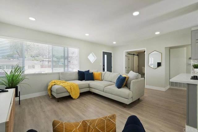 6127 Winchester St, San Diego, CA 92139 - living area featuring light wood-style floors and recessed lighting