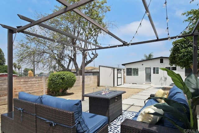 6127 Winchester St, San Diego, CA 92139 - fenced backyard featuring a storage unit, a patio area, an outdoor living space with a fire pit, and a pergola