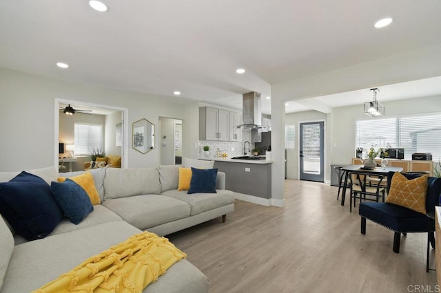 6127 Winchester St, San Diego, CA 92139 - living room with plenty of natural light, recessed lighting, light wood-style flooring, and a ceiling fan