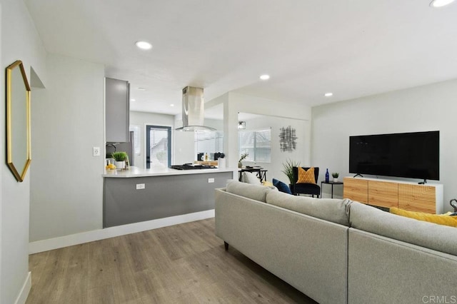 6127 Winchester St, San Diego, CA 92139 - living area featuring wood finished floors and recessed lighting