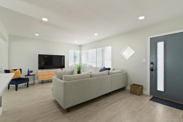 6127 Winchester St, San Diego, CA 92139 - living room with light wood-style flooring and recessed lighting