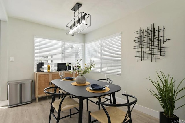 6127 Winchester St, San Diego, CA 92139 - dining area featuring light wood-type flooring and baseboards