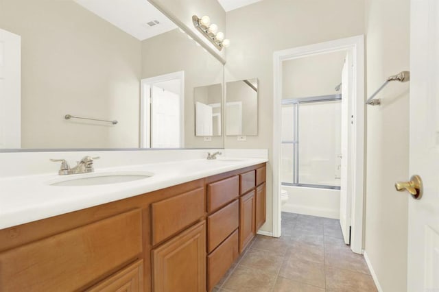 43883 Brookhaven Ct, Temecula, CA 92592 - full bath with double vanity, combined bath / shower with glass door, and tile patterned floors