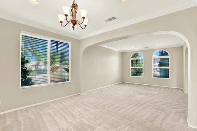 43883 Brookhaven Ct, Temecula, CA 92592 - unfurnished room with arched walkways, light colored carpet, a chandelier, crown molding, and recessed lighting