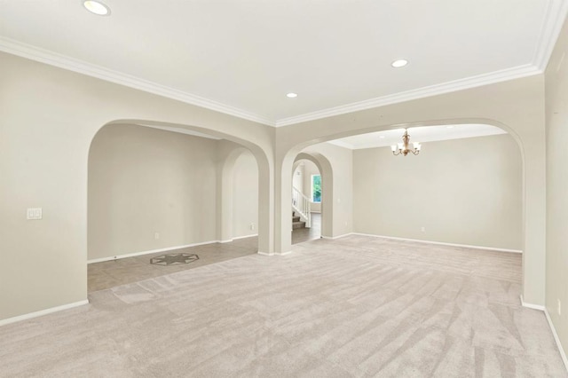 43883 Brookhaven Ct, Temecula, CA 92592 - spare room with arched walkways, ornamental molding, carpet, a chandelier, and recessed lighting