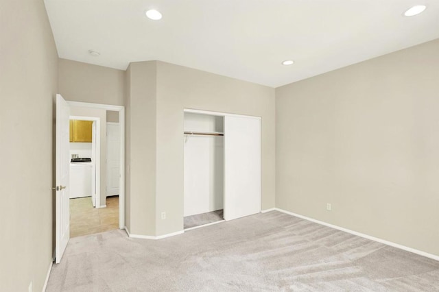 43883 Brookhaven Ct, Temecula, CA 92592 - unfurnished bedroom with light carpet, a closet, recessed lighting, and washer / clothes dryer