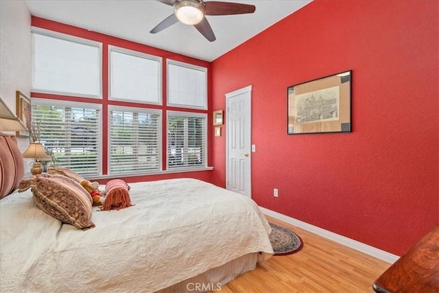 2374 Corydon Ave, Norco, CA 92860 - bedroom featuring wood finished floors, a ceiling fan, and a textured wall