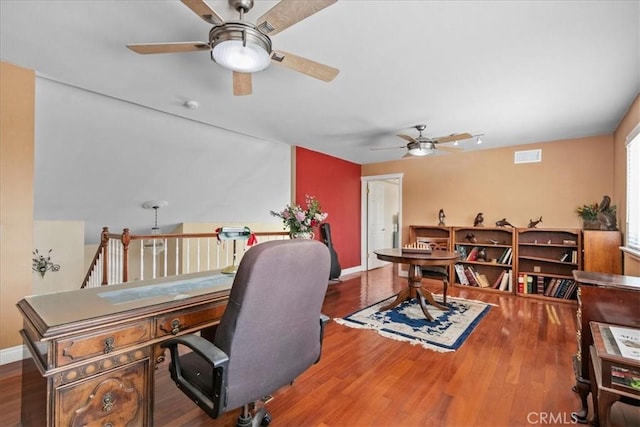 2374 Corydon Ave, Norco, CA 92860 - office space featuring a ceiling fan and wood finished floors