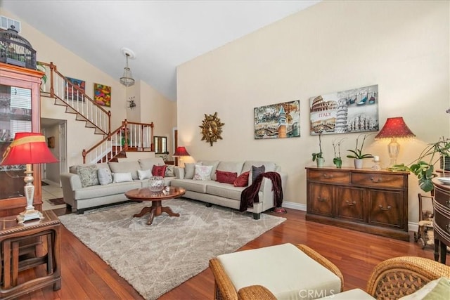 2374 Corydon Ave, Norco, CA 92860 - living area with stairs, wood finished floors, and vaulted ceiling