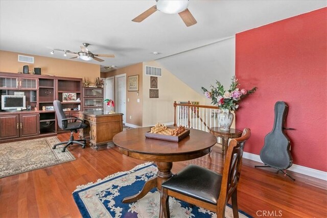 2374 Corydon Ave, Norco, CA 92860 - home office featuring ceiling fan, wood finished floors, and lofted ceiling