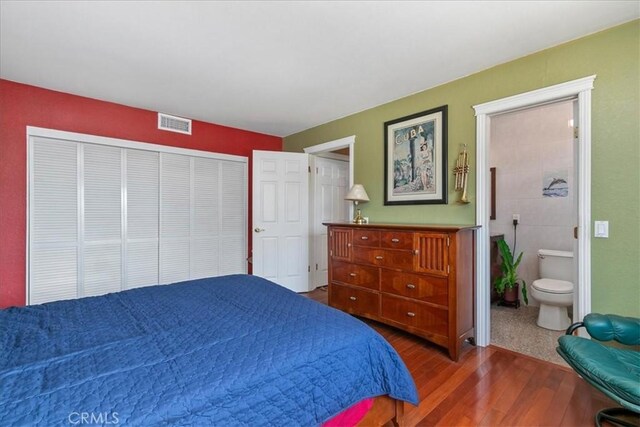 2374 Corydon Ave, Norco, CA 92860 - bedroom with wood finished floors, a closet, and ensuite bathroom