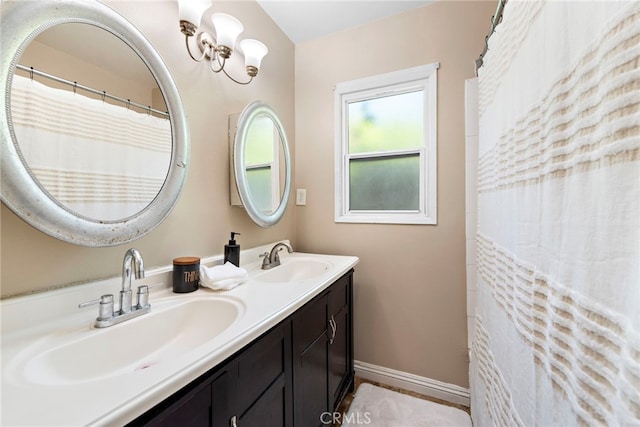 325 Sunrise St, Placentia, CA 92870 - bathroom with double vanity and baseboards