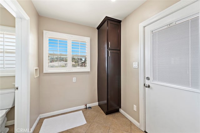 325 Sunrise St, Placentia, CA 92870 - doorway featuring baseboards and light tile patterned floors