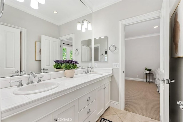 19256 Jasper Hill Rd, Lake Forest, CA 92679 - ensuite bathroom featuring double vanity, crown molding, tile patterned flooring, and recessed lighting