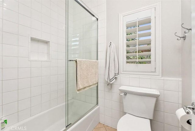19256 Jasper Hill Rd, Lake Forest, CA 92679 - full bathroom featuring shower / bath combination with glass door and tile walls