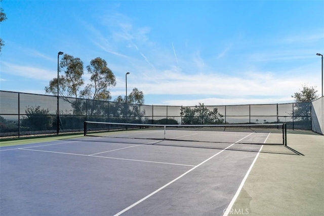 19256 Jasper Hill Rd, Lake Forest, CA 92679 - view of tennis court featuring community basketball court