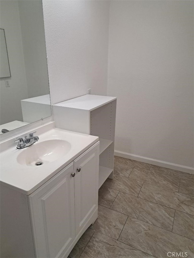 11938 Weller Pl, Moreno Valley, CA 92557 - bathroom with vanity and baseboards