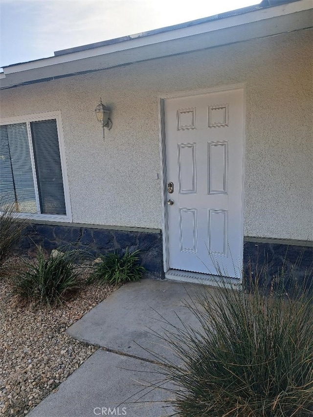 11938 Weller Pl, Moreno Valley, CA 92557 - entrance to property with stucco siding