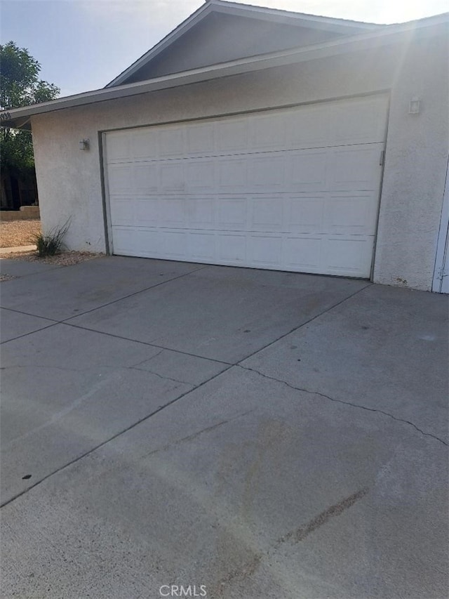 11938 Weller Pl, Moreno Valley, CA 92557 - garage with concrete driveway