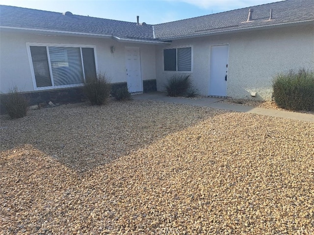 11938 Weller Pl, Moreno Valley, CA 92557 - rear view of house featuring stucco siding