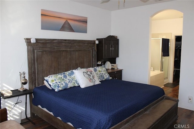31256 Firestone St, Temecula, CA 92591 - bedroom featuring arched walkways, wood finished floors, and ensuite bathroom