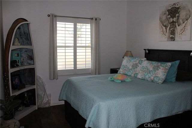 31256 Firestone St, Temecula, CA 92591 - bedroom featuring multiple windows and dark wood-style flooring