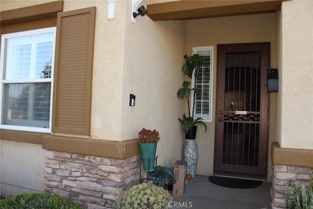 31256 Firestone St, Temecula, CA 92591 - property entrance with stucco siding and stone siding
